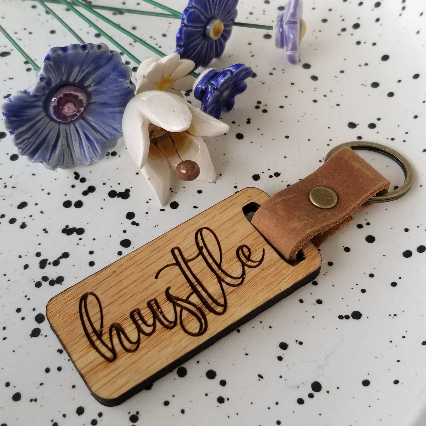 Keychain, Hustle